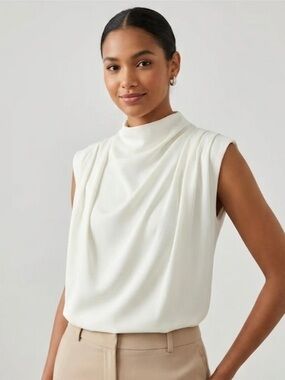 Elegant White Sleeveless High-Neck Blouse